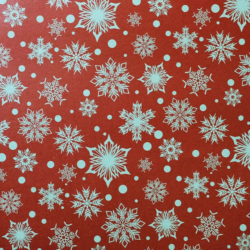  Papel de regalo estilo navideño (Copos naranjas) (PZ039)
