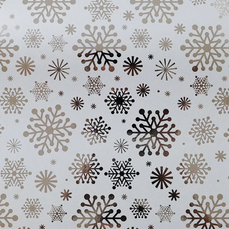 Papel de regalo celebraciones (Copos de Nieve y Estrellas)(PZ018)